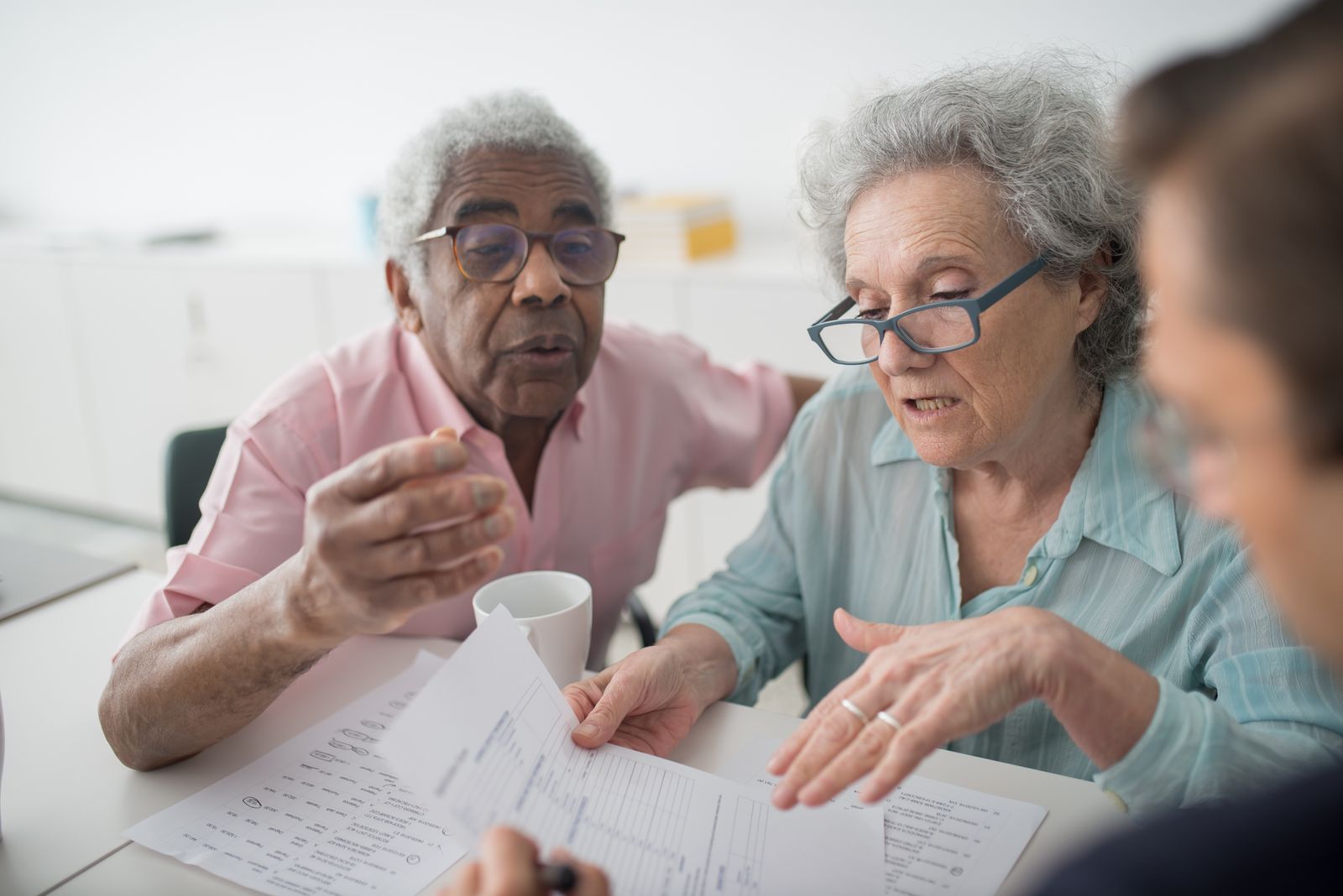 An agent reviewing coverage with clients